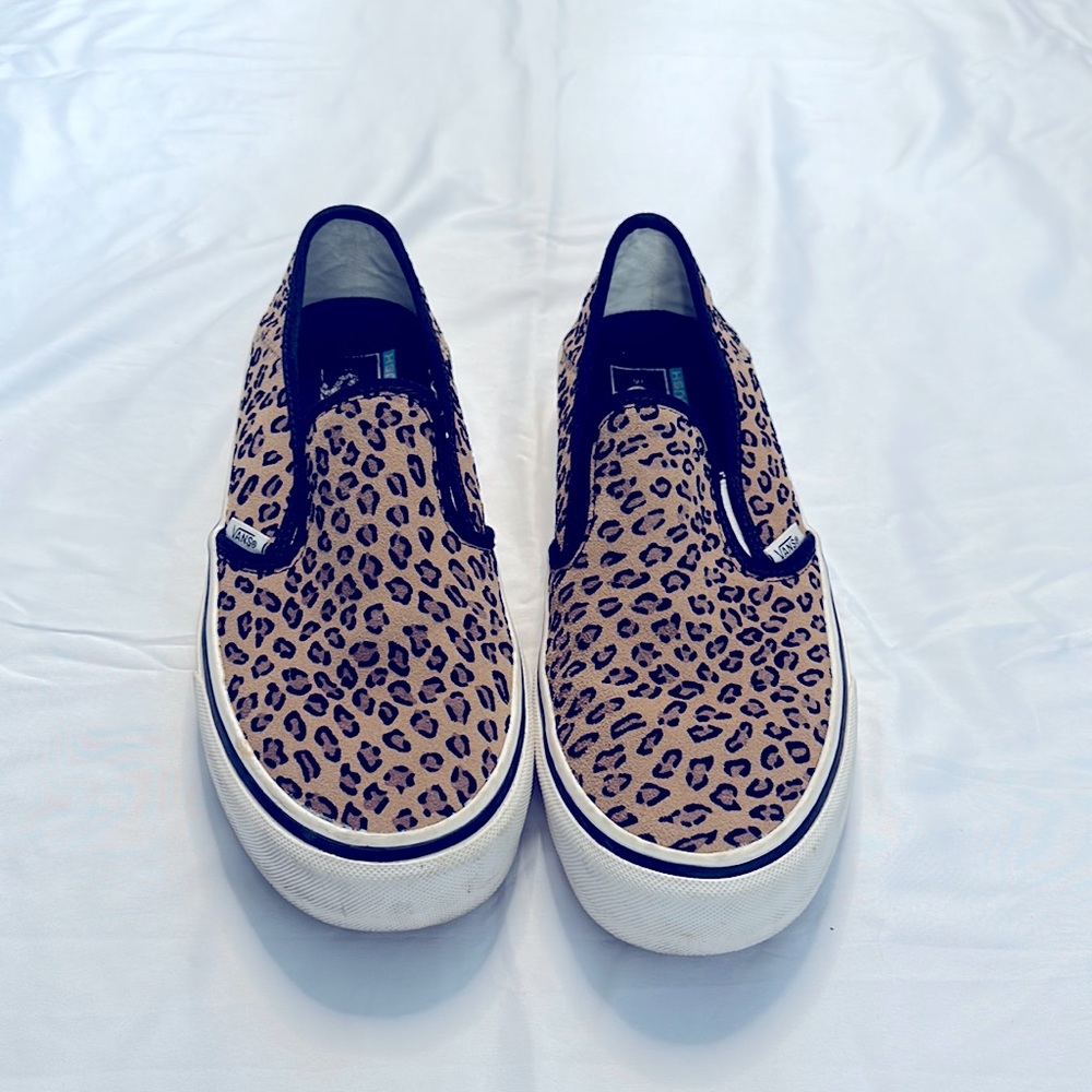 VANS animal print slip on shoes. Size 9M/ 10.5 W.  Great condition.